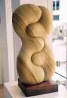 Abstract sculpture carved in sandstone entitled 'Attraction'